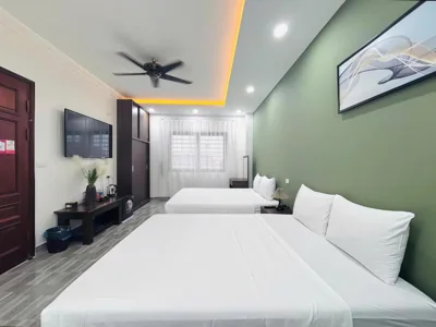 Habitación King con dos camas King — Moon Hotel Apartment 3